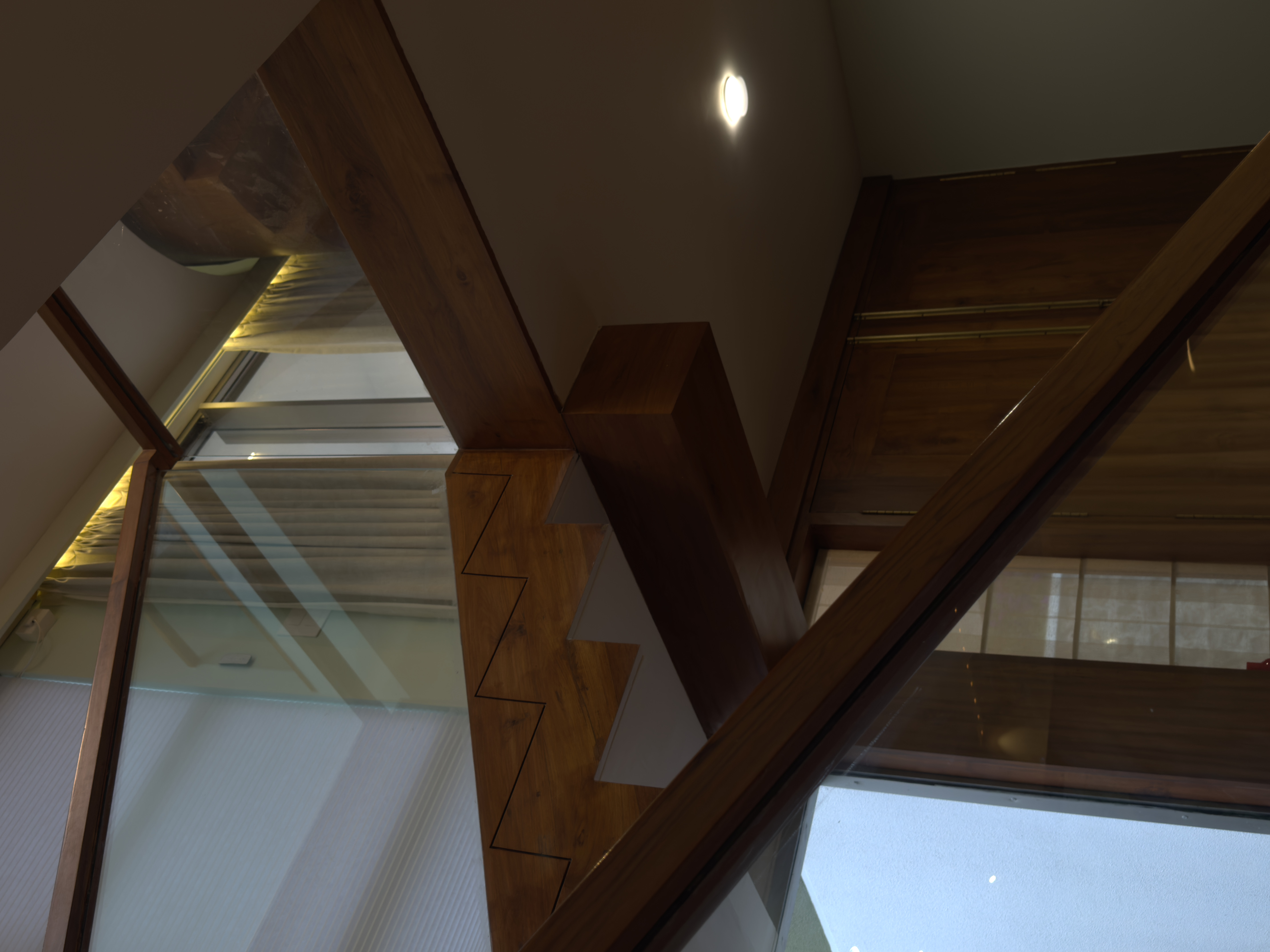 luxury stairway with wood and metal details