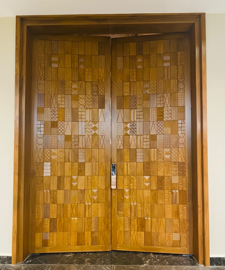 Hand-carved arched double door design