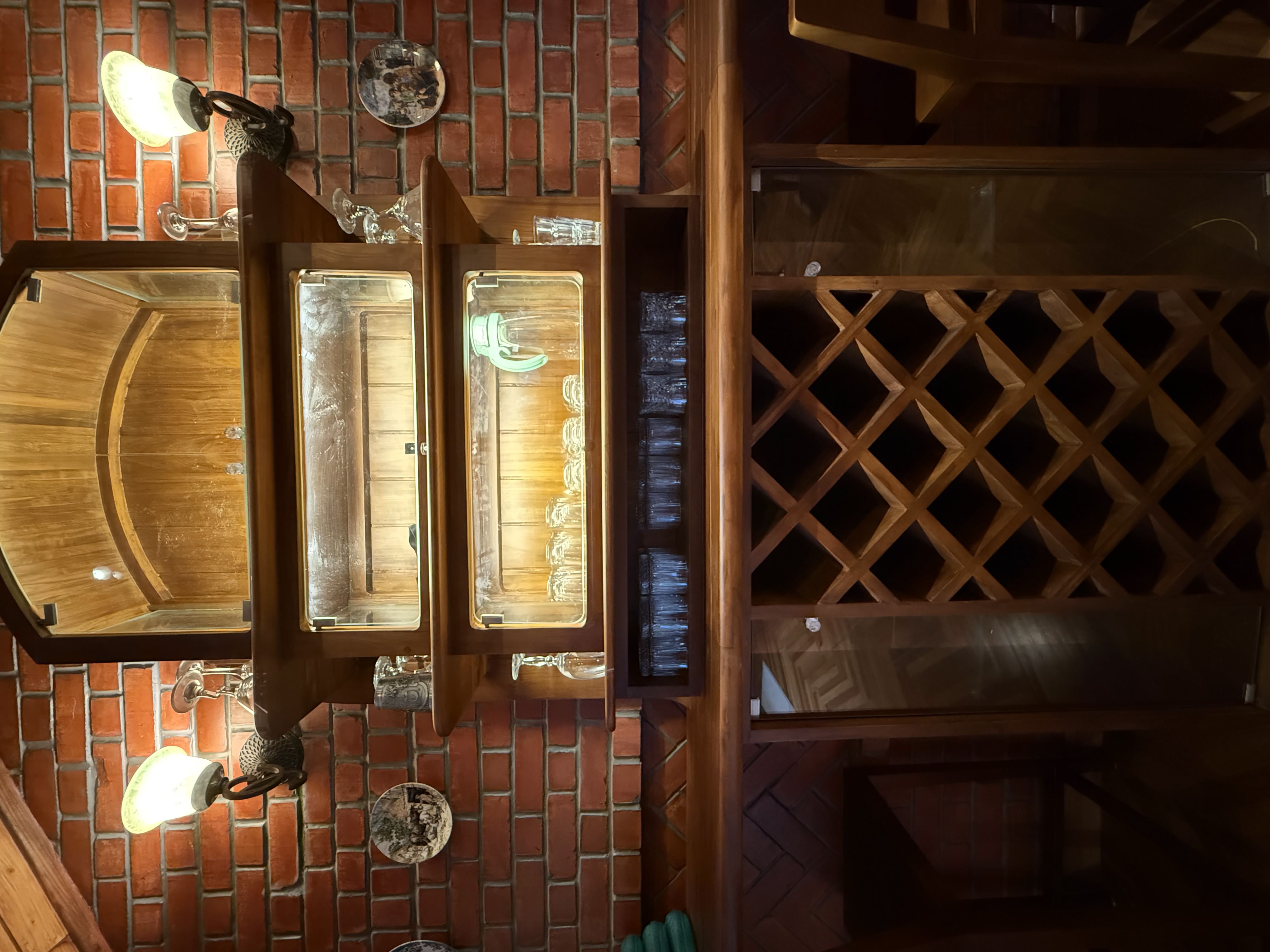 Vintage wooden home bar with glass shelves