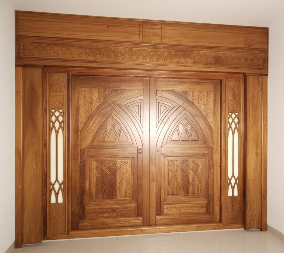 Traditional hand-carved wooden door design